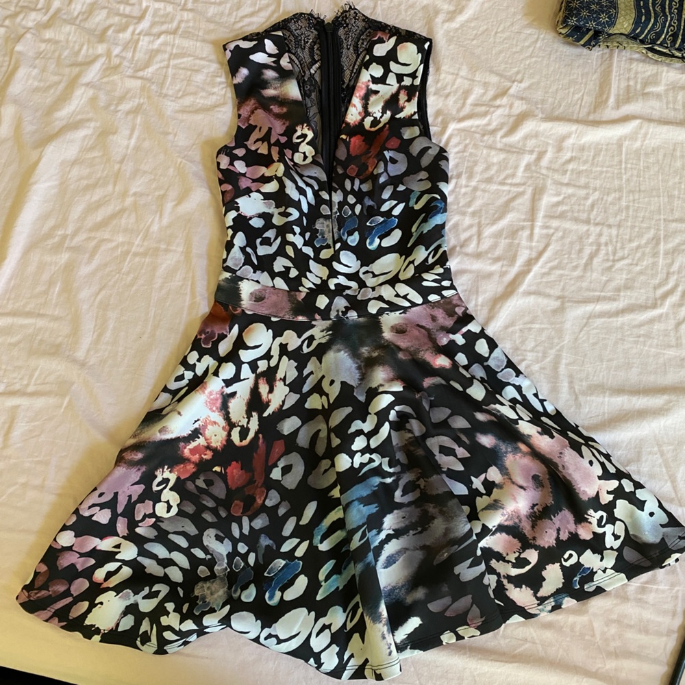 Bebe dress. Brand new with tag. Never worn. Size: XS